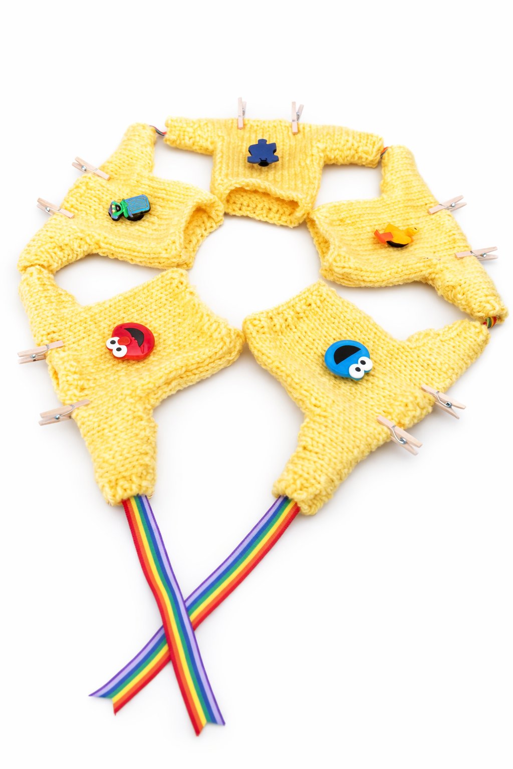 Red mini sweater with colourful buttons